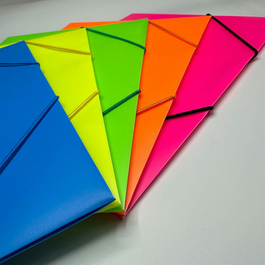 Colorful plastic file folders fanned out on a desk