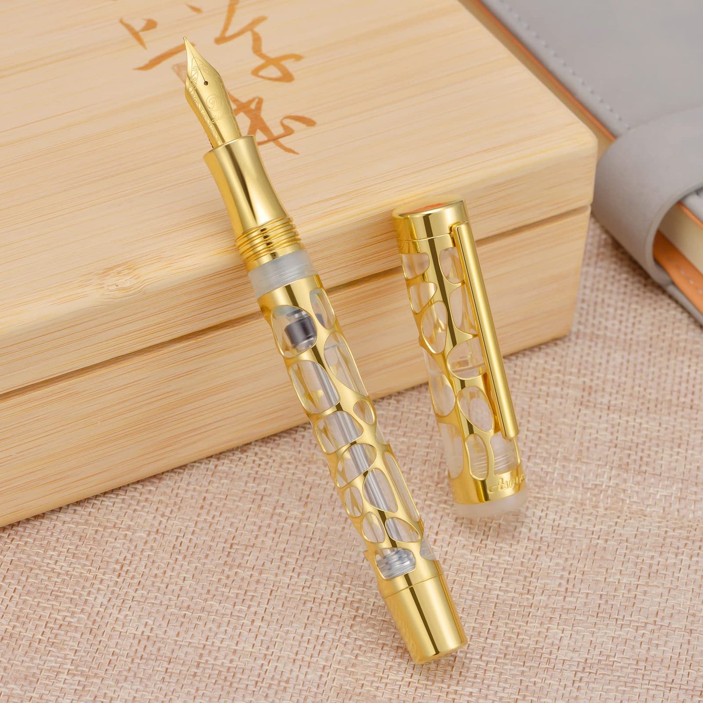 Asvine V169 Vacuum Filling Fountain Pen Extra Fine Nib, Water Drop Skeleton Overlay Gold Trim