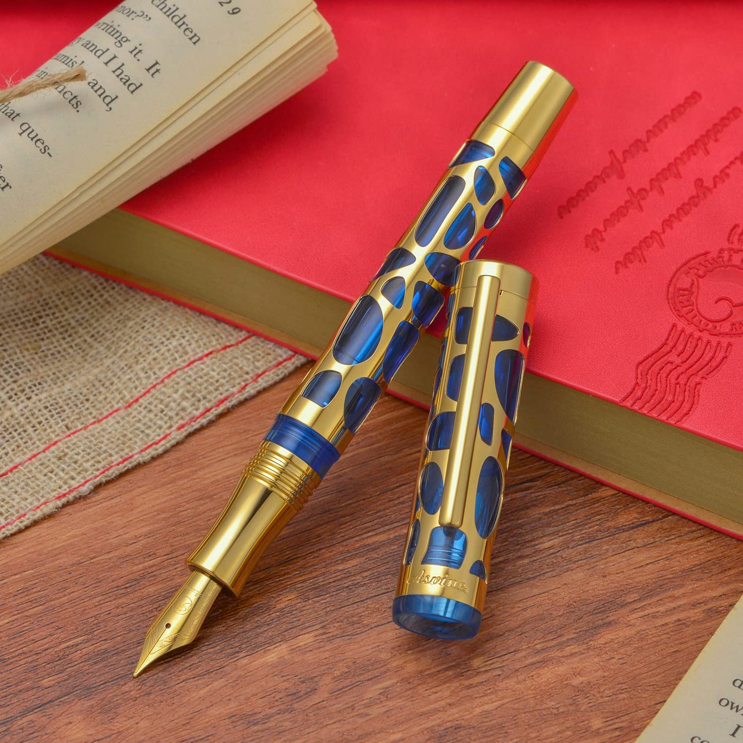 Asvine V169 Vacuum Filling Fountain Pen Medium Nib, Water Drop Skeleton Gold Trim Transparent Blue