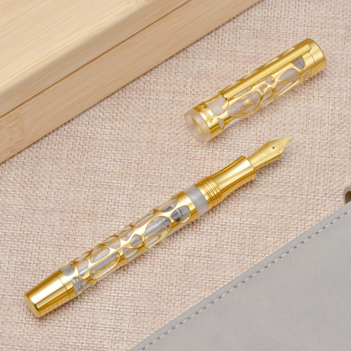 Asvine V169 Vacuum Filling Fountain Pen Extra Fine Nib, Water Drop Skeleton Overlay Gold Trim