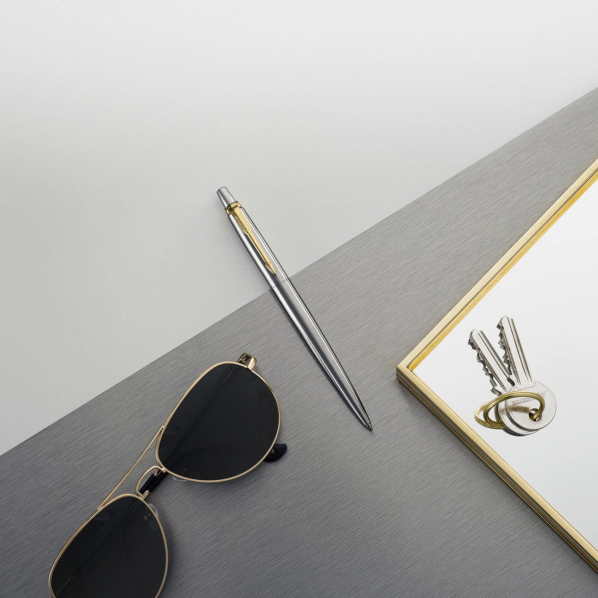 Parker Jotter Ballpoint Pen, Stainless Steel with Golden Trim, Medium Point, Blue Ink, Gift Box